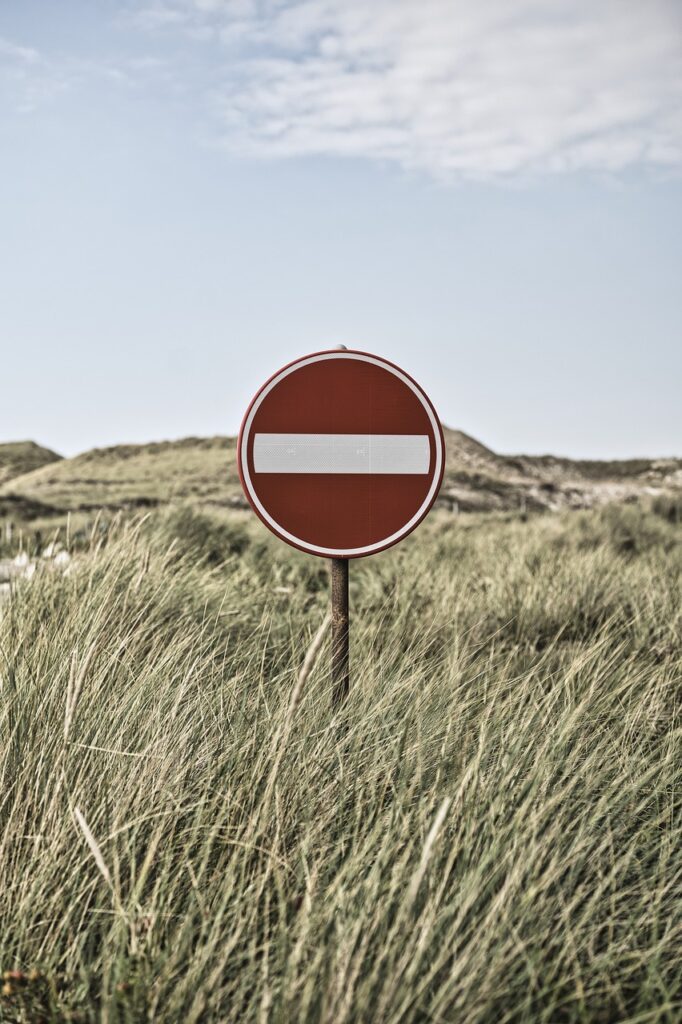 road sign, do not enter, field