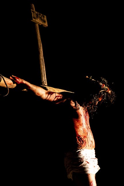 A solemn representation of the crucifixion of Jesus, emphasizing the suffering and sacrifice.